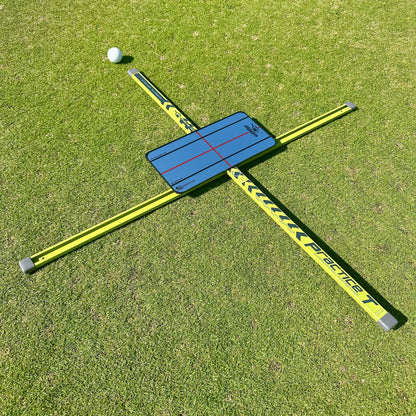 Golf practice device on a grassy surface with a golf ball nearby